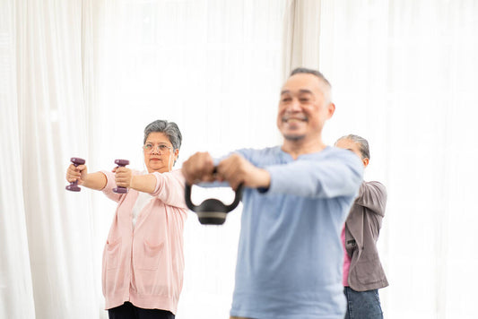 group of active asian elders doing exercise