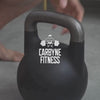 CARBYNE 32KG Adjustable Competition Kettlebell (1kg increments, from 12kg to 32kg) in a fitness setting.